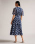 MARLLEE-Dresses-Introducing MARLLEE, your new wardrobe essential. With its sophisticated design and attention-grabbing details, this midi dress is bound to make a statement. Adorned with a stunning painted floral print and featuring short fluted sleeves, it boasts a floaty A-line silhouette that exudes elegance. Style it with heels for an elegant outing with friends or pair it with ankle boots for the daytime.The shell of this product is made of 100% recycled polyester. Using recycled polyester helps divert